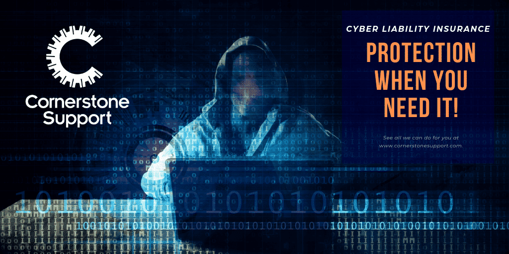 a person in a hoodie using a laptop